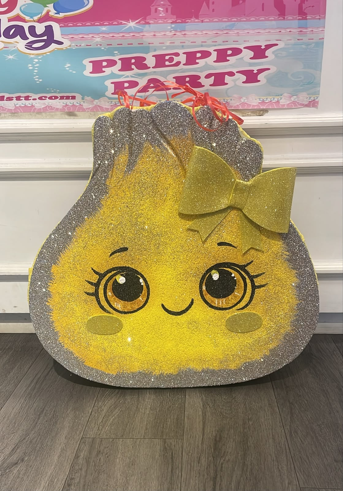 Yellow glitter dumpling piñata