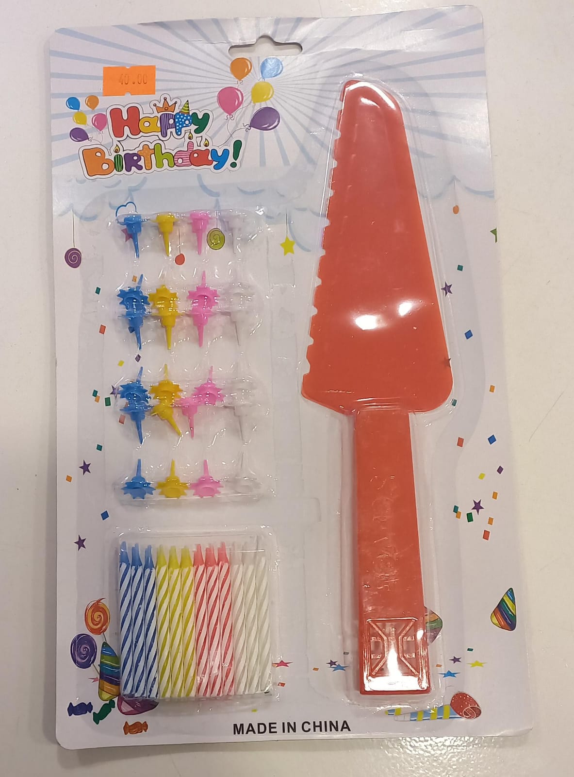 Red Happy Birthday candles with cake spatula