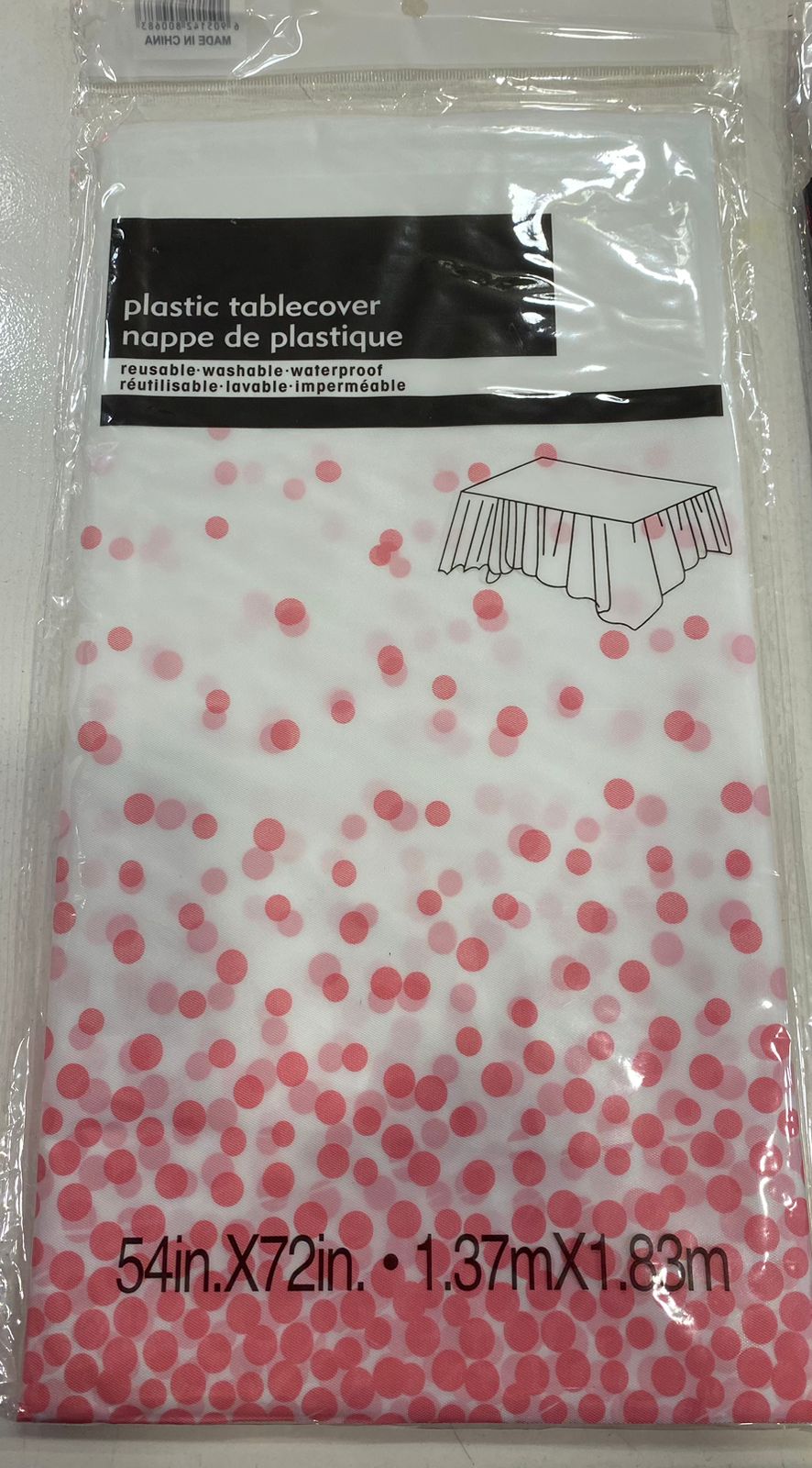 White and pink plastic tablecover