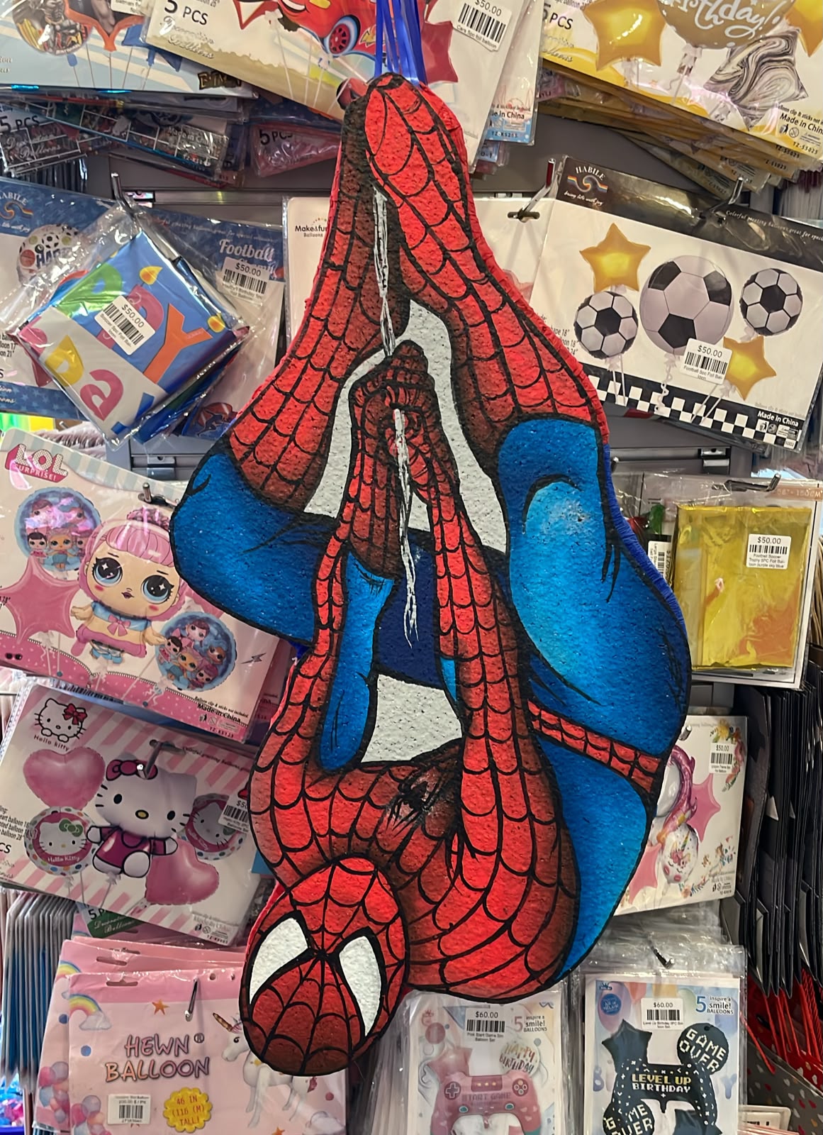 Hanging up Side Down Spider-Man Pinata