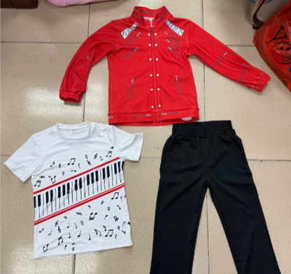 Red jacket with metallic-look detailing, white piano-key and musical-note print T-shirt, and black trousers laid flat.
