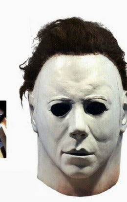 Michael Myers-inspired mask with a pale face, dark eye openings and swept-back dark hair.